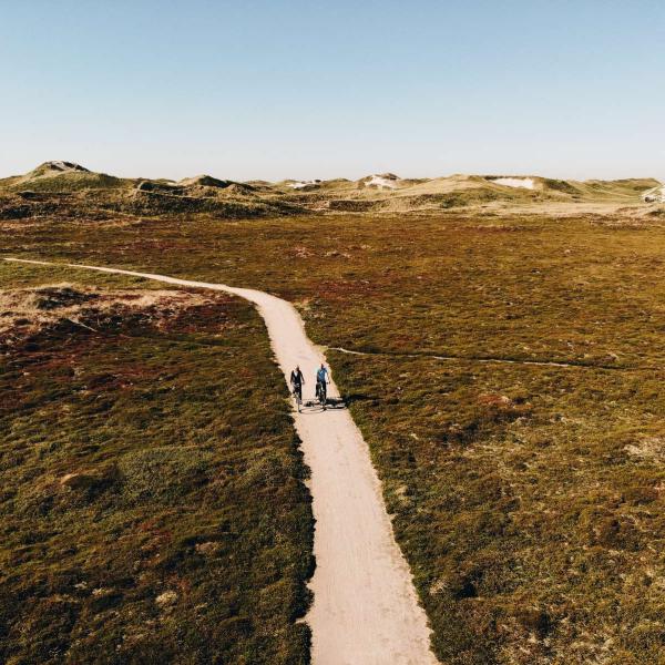 Couple cycling at Nymindegab in West Jutland