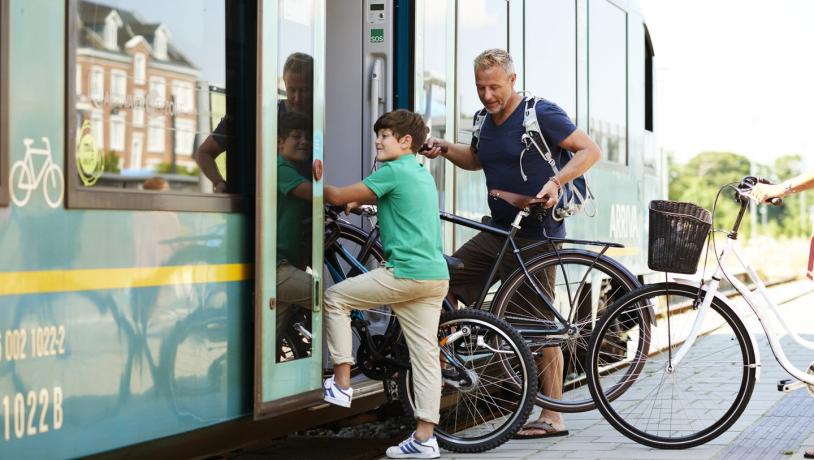 Family with bike in the train, Thisted