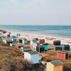 Bunte Strandhütten am Strand von Tisvildeleje