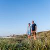 Couple standing in the dunes in Himmerland