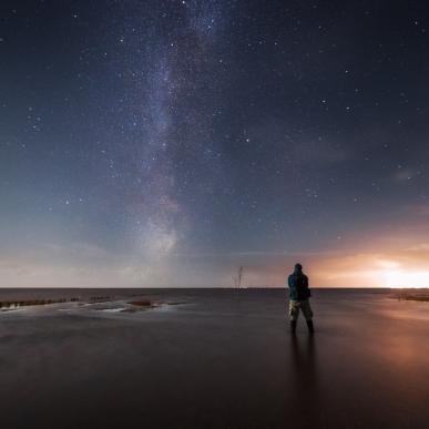 Man underneath the stars, Wadden Sea